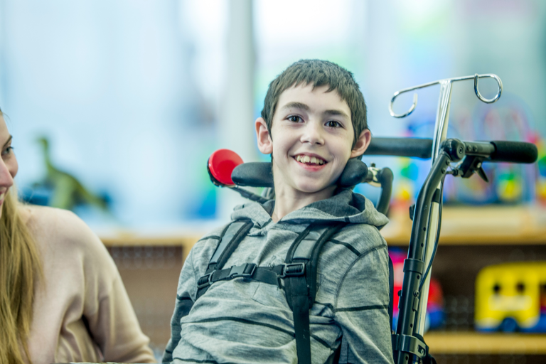 Teenager with learning disabilities in wheelchair