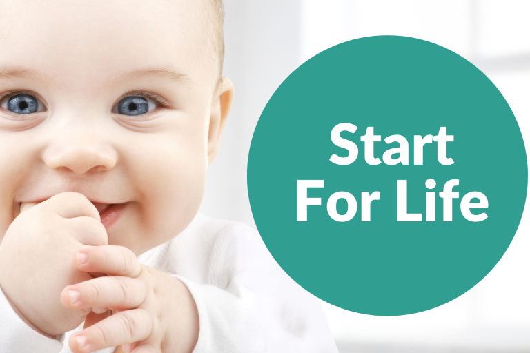 Close up of babies face with start for life wording