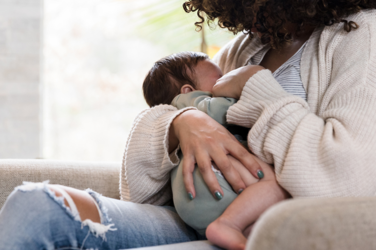 Mum breast feeding baby